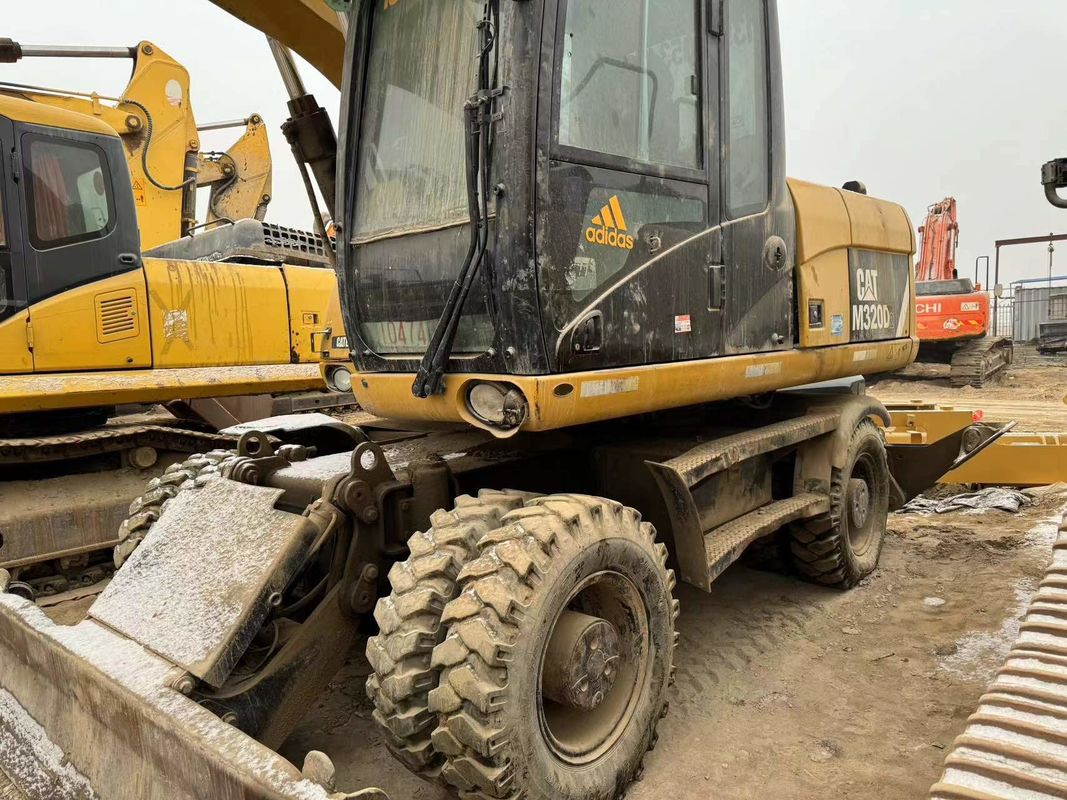 90% Caterpillar M317D2 Gebruikte wielgraafmachine met hoge kwaliteit en beste prestaties te koop