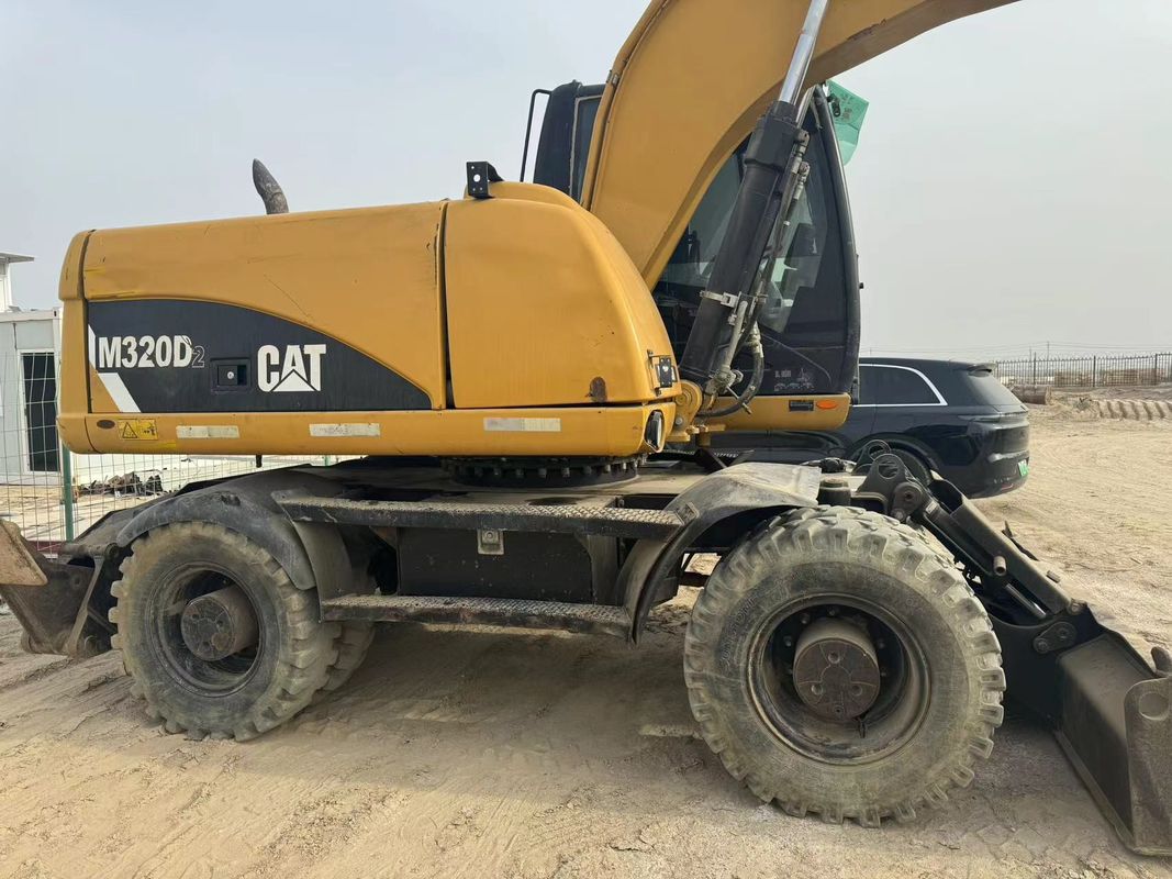 90% Caterpillar M317D2 Gebruikte wielgraafmachine met hoge kwaliteit en beste prestaties te koop