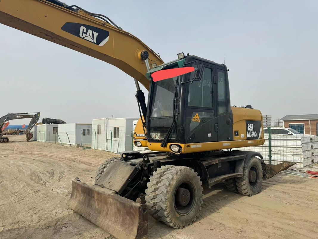 90% Caterpillar M317D2 Gebruikte wielgraafmachine met hoge kwaliteit en beste prestaties te koop