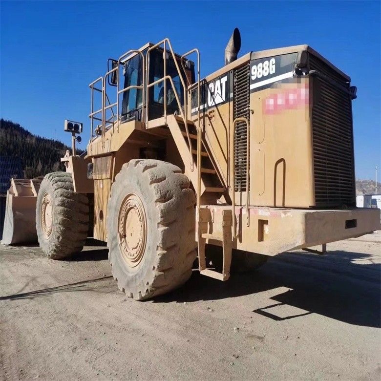 Gebruikte Caterpillar CAT 988G 988 50 ton wiellader met max. ontladingshoogte 4,46 m